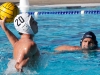 Palomar's Logan Hurst (20) throws goal 2 for the Comets at the 2015 Men's Water Polo Pacific Coast Athletic Conference on Nov. 7 at the Ned Baumer pool. Mesa's Bryan Bare (10) looks on. The Pacific Coast Athletic Conference (PCAC) is an intercollegiate athletic conference governed by the California Community College Athletic Association (CCCAA). Palomar played Mesa in the Championship final but lost 10 - 6. The Comets took second place overall. Coleen Burnham/The Telescope