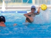 Palomar's Cameron Rath (14) attempts to shoot a goal at the 2015 Men's Water Polo Pacific Coast Athletic Conference on Nov. 7 at the Ned Baumer pool. Mesa's Marco Roy (7) looks on. The Pacific Coast Athletic Conference (PCAC) is an intercollegiate athletic conference governed by the California Community College Athletic Association (CCCAA). Palomar played Mesa in the Championship final but lost 10 - 6. The Comets took second place overall. Coleen Burnham/The Telescope