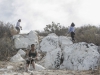 Project “P” volunteer Hiba Dhiyebi (green shirt) takes a break while conducting maintenance on the "P" near the top of Owens Peak May 1. Philip Farry / The Telescope