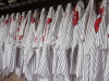 Palomar baseball team uniforms hang in the dugout before the season opener at the new field on Jan. 27. Stephen Davis/The Telescope