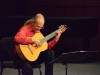 Randy Pile plays Sonata a la española during Concert Hour at the Howard Brubeck Theatre on Thursday Sept. 10, 2015. Pile has been teaching classical guitar at Palomar College for approximately 20 years. He has been a touring artist for the California Arts Council and has given performances in the USA, Europe, Canada and the South Pacific. Yvette Monteleone/The Telescope