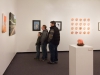 The Walters family looks through the many art pieces on display and stops to admire a photograph by Will Gibson at the Annual Faculty Exhibition at the Boehm Gallery, Palomar College. Dec. 2, 2015. Patty Hayton/The Telescope