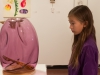 Mira Marchuk puzzles over a beautiful glass piece with a secret inside at the Faculty Exhibition at the Boehm Gallery, Palomar College, San Marcos, December 2; 2015; Patty Hayton/The Telescope