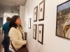 Helen Thomas stops to admire a palladium prints by Donna Cosentino at the Annual Faculty Exhibition at the Boehm Gallery, Palomar College, Dec. 2; 2015. Patty Hayton/The Telescope