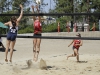 Palomar’s Kelli Iverson (10) jumps to make the block as her teammate Gabby Hutzler (15) during the first set against MiraCosta college. The Grossmont Griffins hosted both MiraCosta Spartans and Comets in sand volleyball March 20. The Comets lost to the Spartans 4-1 and to the Griffins 5-0. Philip Farry | The Telescope