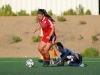 Samantha Swanson, Forward #23, dribbles past the fallen Brianna Lazzarini, Goal Keep #1, from the College of the Desert's visiting team the Roadrunners at Minkoff Field, Paloamar College, Saturday, Sept. 18, 2015. Swanson scores the Commets thrid goal with only 8 minutes left to the second half. Brandy Sebastian/The Telescope