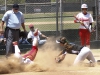 Palomar’s Kali Pugh slides head first into home plate as Leah Gordon (21) looks on. against. The Comets beat the Cuesta College Cougars 21-4 in five innings on May 3. Philip Farry / The Telescope