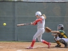 Palomar right fielder Tayler Moore (11) hits the ball down the 3rd base line. April 8 home game was against Grossmont College. Comets won 11-3 over the Griffins. Tracy Grassel/The Telescope