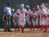 The Palomar Women's Softball team wait at home base for team-mate Brooke Huddleson (4) to congratulate her on the home run hit that resulted in 3 points for Palomar agaisnt Mt. San Antonio, April 4. Palomar had previously beaten Santiago Canyon College during their first double header game 5-2, and came out on top of Mt. San Antonio 4-1. Dirk Callum/The Telescope