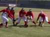 Palomar's Brooke Huddleson, Sara Rodriguez, Kealani "Nani" Leonui, Iesha Hill, and Anjelea Stewart relax by playing a game of Pepper prior to the start of the softball game against visiting Mt San Jacinto 03 April. The Comets went on to beat the Eagles 9-1 and improved their record to 23-1-1 (13-0 PCAC). Philip Farry / The Telescope