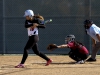 Palomar's Kealani Leonui (16) hits a double to bring in two runs against San Diego City College on March 30 at Palomar Softball Field. The Comets won the game 9-0. Johnny Jones / The Telescope.