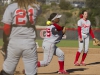 Palomar third baseman Lesha Hill (25) fields a bunt during the third inning (L/R Leah Gordon (21) and Summer Evans (2) look on) on March 4. Palomar ranked #4 in the State beat the visiting San Diego City College 12-0 in five innings and improved their record to 14-1-1 (6-0 in conference play). Philip Farry / The Telescope