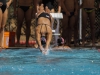 Palomar swimmer Paulina Dehaan dives into the pool after Morgan Brown touches the wall during the women’s 200-yard Medley race on March 20 at the Wallace Memorial Pool against visiting Mesa College. Dehaan secured wins in the 200-yard backstroke 2:25.48 and 100-yard butterfly 1:02.41. Philip Farry / The Telescope