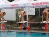 Palomar's Lucy Gates (L), Dallas Fatseas (R) and Grossmont's Isabella Martinez (C) get ready to swim the Women's 1000 Yard Freestyle during the swim meet against Grossmont on April 8 at the Wallace Memorial Pool. Gates placed second with a time of 12.14.62 and Fatseas placed third with a time of 12.39.76. Coleen Burnham/The Telescope