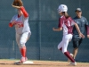 Palomar 1st basemen Katy McJunkin (34) records a put-out against Southwestern's runner Aryn Perez (2) during the April 13 home game. Comets won 8-0 in the sixth inning. Tracy Grassel/The Telescope