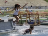 Palomar’s Sarah Martinez (#5) leaping over the hurdle and avoids a fallen runner during the the 3000 meter steeplechase, Martinez finished the race in fifth place. The Comets were participating in the Pacific Coast Athletic Conference Track & Field Championships on April 18 at Mesa College. Philip Farry / The Telescope.