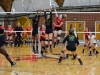 Madison Stark, Opposite Hitter #8, gains height while nudging the ball over the net during a home game against Grossmont College, the Dome Sept. 30. Brandy Sebastian/The Telescope