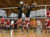 Palomar’s Madison Stark spikes a ball against Grossmont’s blockers Janelle Ayala (L) #16 and Robyn Arthur (C) #1 at a home game, the Dome Sept. 30, 2015. Brandy Sebastian/The Telescope