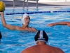 Palomar's Elijah Foli gets ready to throw the ball during the men's water polo game on Sept. 30 at the Ned Baumer Pool. Miramar's Jeff Burr and Justin Lopez attempt to defend. Palomar defeated Miramar College 20 to 5. Coleen Burnham/The Telescope