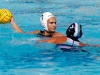 Palomar's Dallas Fatseas gets ready to throw the ball over Miramar's Alex Lozano during the game at the Ned Baumer Pool on Sept. 30. Palomar defeated Miramar 15 to 4. Coleen Burnham/The Telescope