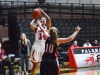 Roshell Lamug #14, guard, scores 2 points against Santa Ana’s point guard, Tori Liebel #10, The Dome, Nov. 5, 2015. Lamug scores 8 points total assisting in a Comets win 86-60 (1-0). Brandy Sebastian/The Telescope