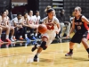 Palomar guard Cheyenne Ertz #24 dribbles around Santa Ana point guard, Tori Liebel #10, The Dome, Nov. 5, 2015. Ertz scores 2 points towards the teams lead 79-49 with 5:32 left in the game, Palomar wins 86-60 (1-0). Brandy Sebastian/The Telescope