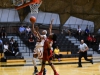 Palomar's Regina Sheffield (20) scores two points over Chariene Charles (4) extended the comets lead 9 to 2 during the women's basketball game against Imperial Valley at the Dome on Feb. 10. Palomar defeated Imperial Valley 87-23. Johnny Jones/The Telescope