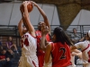 Palomar guard Cheyenne Ertz (24) fights over a rebound with Imperial Valley forward Charlene Charles (4) during the Feb. 10 game at the Dome. Palomar defeated Imperial Valley 87-23. Tracy Grassel/The Telescope