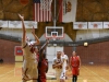 Palomar's Lynnzy Troxell (44) guard scores two points over Paloma Medina (23) during the women's basketball game against Imperial Valley at the Dome on Feb. 10. Other players Quinesha Vanhook (15) rush in for the rebound. The Comets won 87-23. Johnny Jones/The Telescope