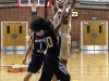 Palomar's Quinesha Vanhook (15) attempts a 2 point shot during the women's basketball game against Mira Costa at the Dome on Jan. 27. Mira Costa players Camille Blayecook (10) and Danielle Bosley (1) try to defend the shot. The Comets won 83-34. Coleen Burnham/The Telescope