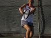 Palomar's Rebecca Benson returns the ball during her Singles match against San Diego Mesa College at the Palomar Tennis Courts on Feb 26. Benson lost her Singles match, but won her Doubles with partner Christina Nguyen (not seen). Dirk Callum/The Telescope