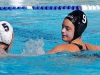 Palomar's Karynne Ryan (9) gets ready to throw the ball over Miramar's Makana Edwards (5) at the 2015 Women's Water Polo Pacific Coast Athletic Conference on Nov. 7 at the Ned Baumer pool. The Pacific Coast Athletic Conference (PCAC) is an intercollegiate athletic conference governed by the California Community College Athletic Association (CCCAA). Palomar defeated Miramar 14 - 6. The Comets took third place overall. Coleen Burnham/The Telescope