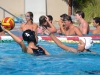 Palomar Carley Woods, 4, throws the ball to a fellow Comet in the Wallace Memorial Pool on Oct. 14. Palomar defeated Southwestern 19-3. Kari Clarke/ The Telescope