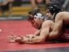 Palomar’s Zack Moistner wrestling in the 125 pound weight class struggles to escape the bottom against visiting Rio Hondo wrestler Luis Perez. Perez wound up winning the match on points and the Roadrunners upset the Comets 23-18 at the Dome Nov. 04. Philip Farry / The Telescope