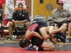 Palomar’s Arturo Osorio wrestling in the 149 pound weight class does everything possible to not allow Rio Hondo wrestler David Romero Luis to escape and earn points. Romero wound up winning the match on points and the Roadrunners upset the Comets 23-18 at the Dome Nov. 04. Philip Farry / The Telescope