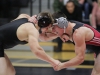 Palomar’s Kirk Kalisewski (right) wrestling in the 157 pound weight class clinches Rio Hondo wrestler James Schmidt. Schmidt wound up winning the match on points and the Roadrunners upset the Comets 23-18 at the Dome Nov 04. Philip Farry / The Telescope