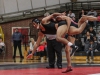 Palomar’s 165 pound wrestler Louie De La Torre (right) earns 2 pts for slamming Rio Hondo wrestler Roger Arce to the mat during the first period. Arce wound up winning the match on points and the Roadrunners upset the Comets 23-18 at the Dome Nov. 04. Philip Farry / The Telescope