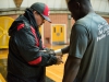 Palomar trainer Dennis Greenhill, wraps up Palomar's wrestler Seville Hayes prior to the competition against Santa Ana at the Dome, Oct. 28, 2015. Brandy Sebastian/The Telescope