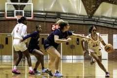 Palomar College guard Ivori Seals drives past Irvine Valley College forward Gianna DeForest (#32) during the third quarter on Nov. 1 2025 at The Dome. Photo credit: Evan Odom