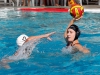 Palomar's Emily Foltz (11) gets ready to throw the ball over Grossmont's Katie Merritt (12) during the women's water polo game at the Wallace Memorial Pool on Oct. 21. Palomar defeated Grossmont 11 - 10. Coleen Burnham/The Telescope