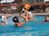 Palomar's Carley Woods (4) attempts a to shoot a goal while Grossmont’s Elyssa Perrins (middle) and Alex Hultman (9) defend the ball, during the women's water polo game at the Wallace Memorial Pool on Oct. 21. Palomar's Dallas Fatseas (back right) looks on. Palomar defeated Grossmont 11 - 10. Coleen Burnham/The Telescope