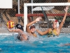 Palomar's Lauren Wimsatt throws the winning goal (11) for the Comets over Grossmont’s Elyssa Perrins (forward) and Nevada Hutt (goalie) during the women's water polo game at the Wallace Memorial Pool on Oct. 21. Palomar defeated Grossmont 11 - 10. Coleen Burnham/The Telescope