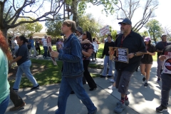 Attendees marching on March, 12, 2026 alongside the Clock Tower Lawn at Palomar College. 