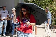 Jena Kruhmin, CCE Vice President of Membership, leads a chant at the "March in March" event on Thursday, March 12, in the LRC Plaza.