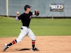 Feb 3rd, 2015 | Dylan Breault #4 fields a ground ball against the Orange Coast College Pirates. Seth Jones / The Telescope