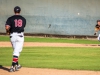 Feb 3rd, 2015 | Vince Mori #18 fields a ground ball and throws it to Niko Holm #23 for the easy out during their game against Orange Coast College at Meyers Field. Seth Jones / The Telescope