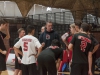 Palomar College Men's Volleyball head coach Bjorn Dahl (center) discusses strategy with his team during a time out in their game against Orange Coast College, Wednesday April 2, 2014 in the Dome. Lucas Spenser/Telescope.