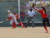 Palomar's Taylor Willis (with bat) follows the ball as it drops over the head of Mt. San Jacinto's Angie Lopez into left field for a single during the 2nd inning on March 11 at Palomar College Softball Field. The Comets won the game 9-1 in the 5th inning. Stephen Davis/The Telescope