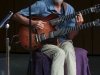 Peter Sprague playing his guitar at Howard Brubeck Theatre for the first Concert Hour of the semester Sept. 5, 2014. Sprague played jazz with Gunner Biggs and Gilbert Castellanos. Photo: Yoshikazu Yamashita | The Telescope