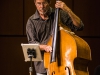 Gunner Biggs plucks on his upright bass in the first Concert Hour performance of the year at the Howard Brubeck Theatre on Sept. 5. Biggs performed jazz with Gilbert Castellanos and Peter Sprague. Photo: Casey Cousins | The Telescope